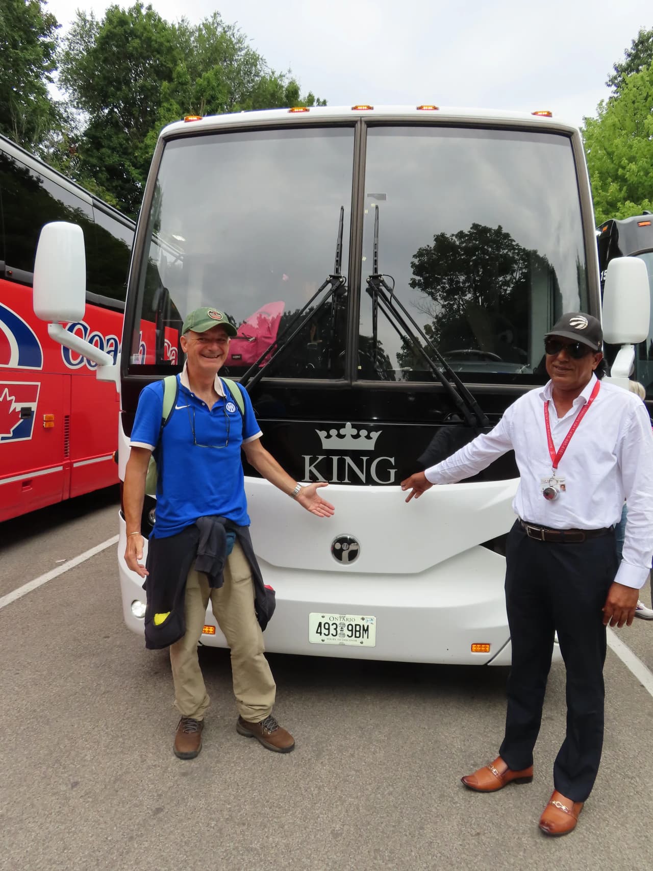 Our Prevost coach with a guest and the driver